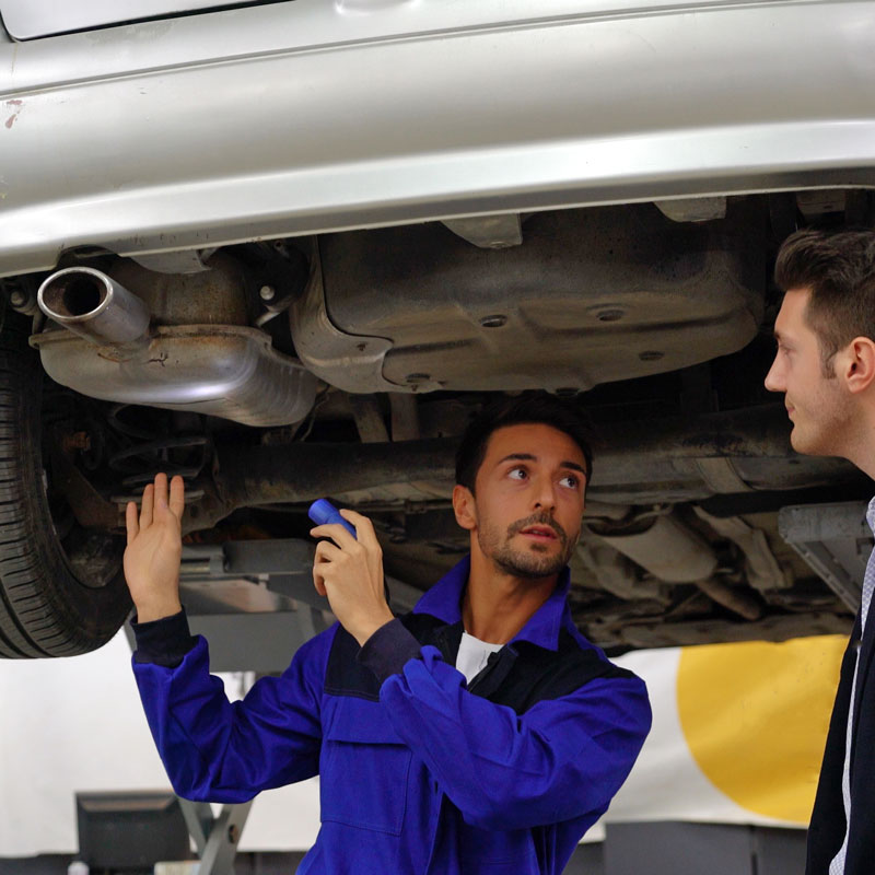 mechanic talking to customer